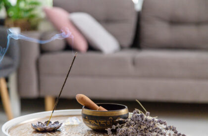 Incense sticks and yoga accessories. Selective focus. Home.