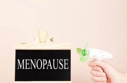 menopause-word-written-on-black-board-and-hand-hol-2025-02-10-09-26-34-utc