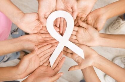 women-hands-circle-holding-breast-cancer-white-rib-2025-03-18-16-57-48-utc